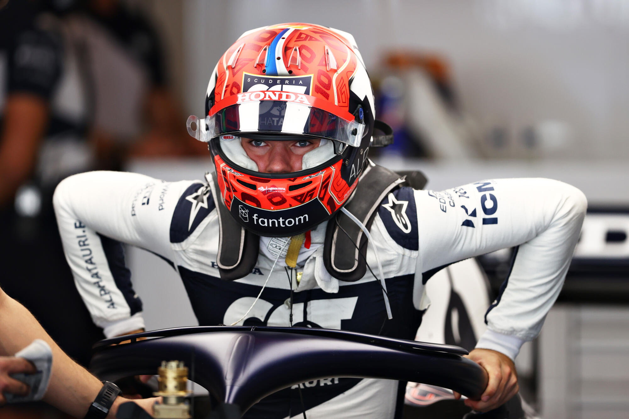 Pierre Gasly sits down during testing days Abu Dhabi 2021