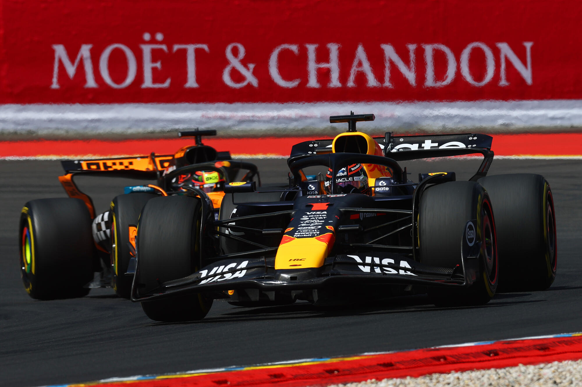 Verstappen Piastri auto's